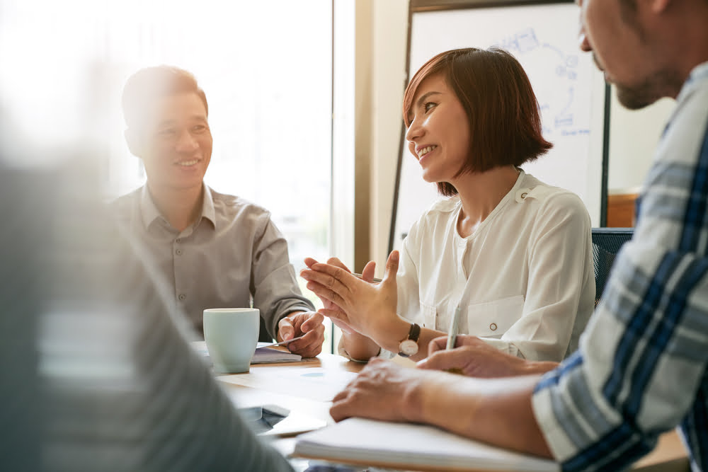 A Turning Point for Commercial Leasing: The Proposed Ban on Upwards-Only Rent Reviews 2 people talking about commercial leasing - Fiona Bruce Solicitors