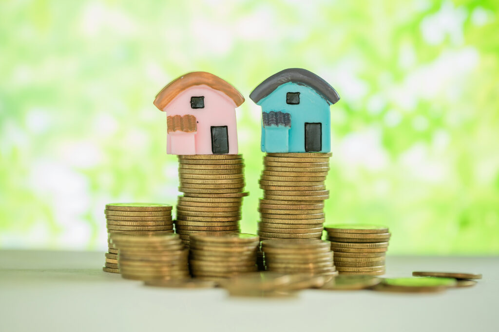 Right to Manage (RTM): taking control of your building means taking on responsibility 2 mini house stack coins with green blur